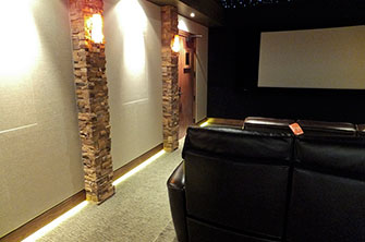 Stone Veneer Columns and Baffle Walls in Home Theater