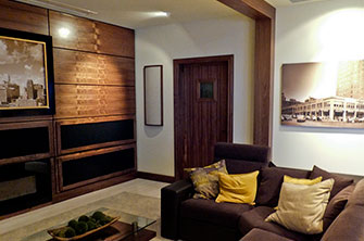Living Room with Soundproof Door, Acoustic Wall Art, and Curve Low-Profile Diffusor